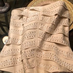 Studded champagne bustier.